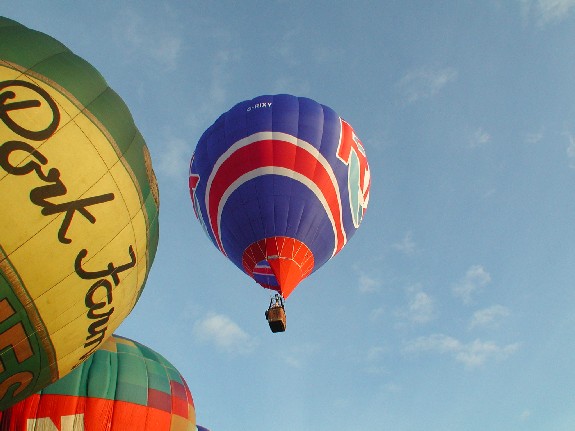 A hot-air balloon rises into the air
